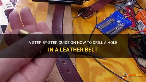 drilling hole in leather belt.